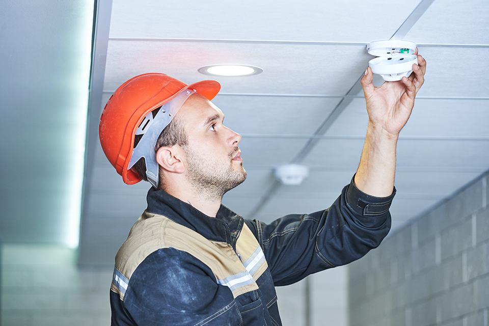 Optical smoke detector installation in London